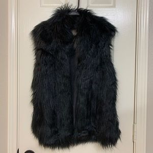 Black faux fur vest